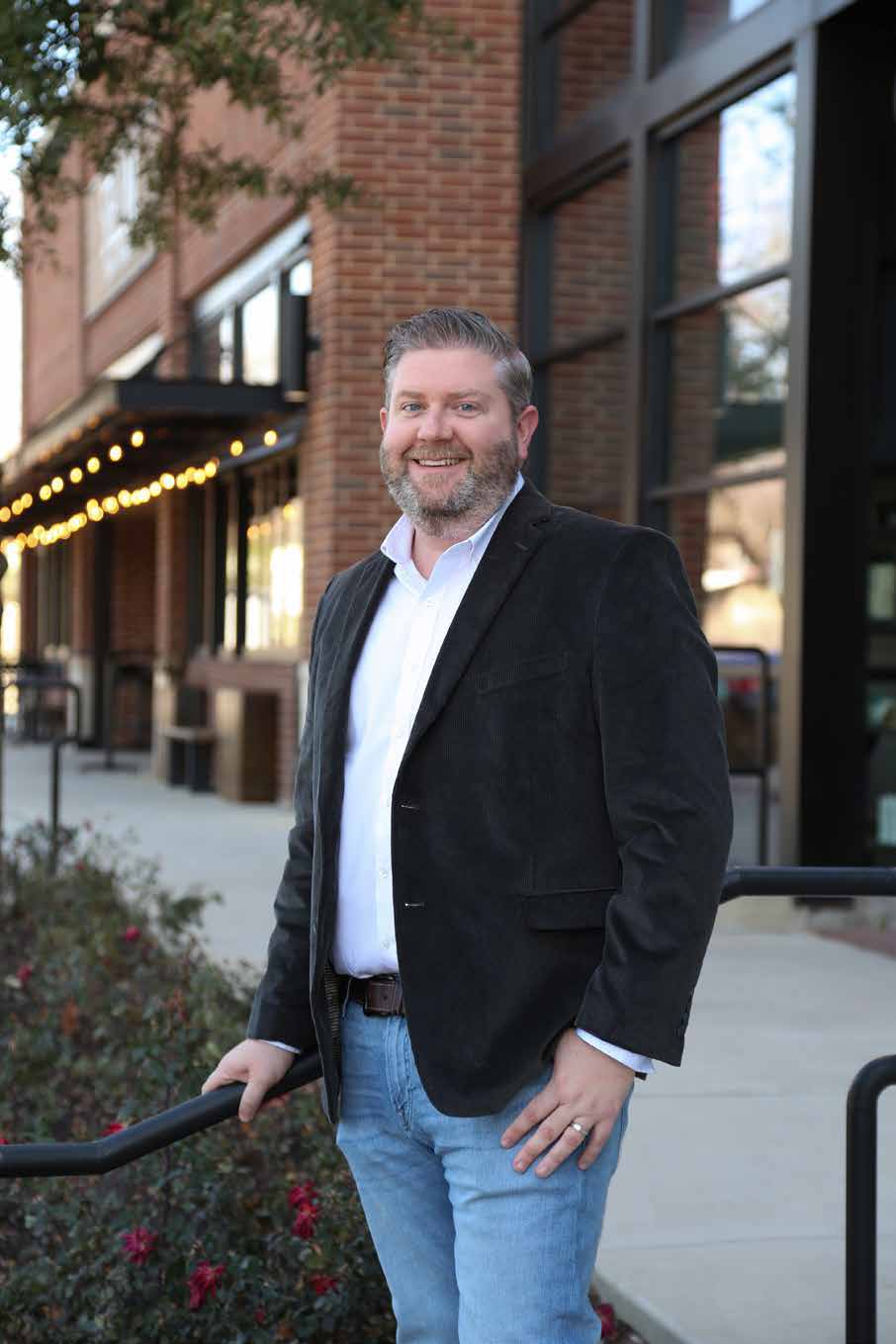 Todd Bingham standing outside for his Real Producers profile